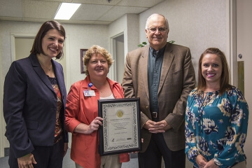 Katelyn McKee, LifeSource organ and tissue hospital services manager; Barb Boettcher, RN, St. Luke’s critical care manager; John Strange, St. Luke’s President/CEO; Katelyn Wilson, RN, LifeSource hospital liaison